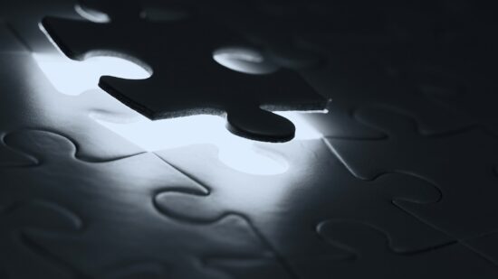 Final puzzle piece hovering over position.